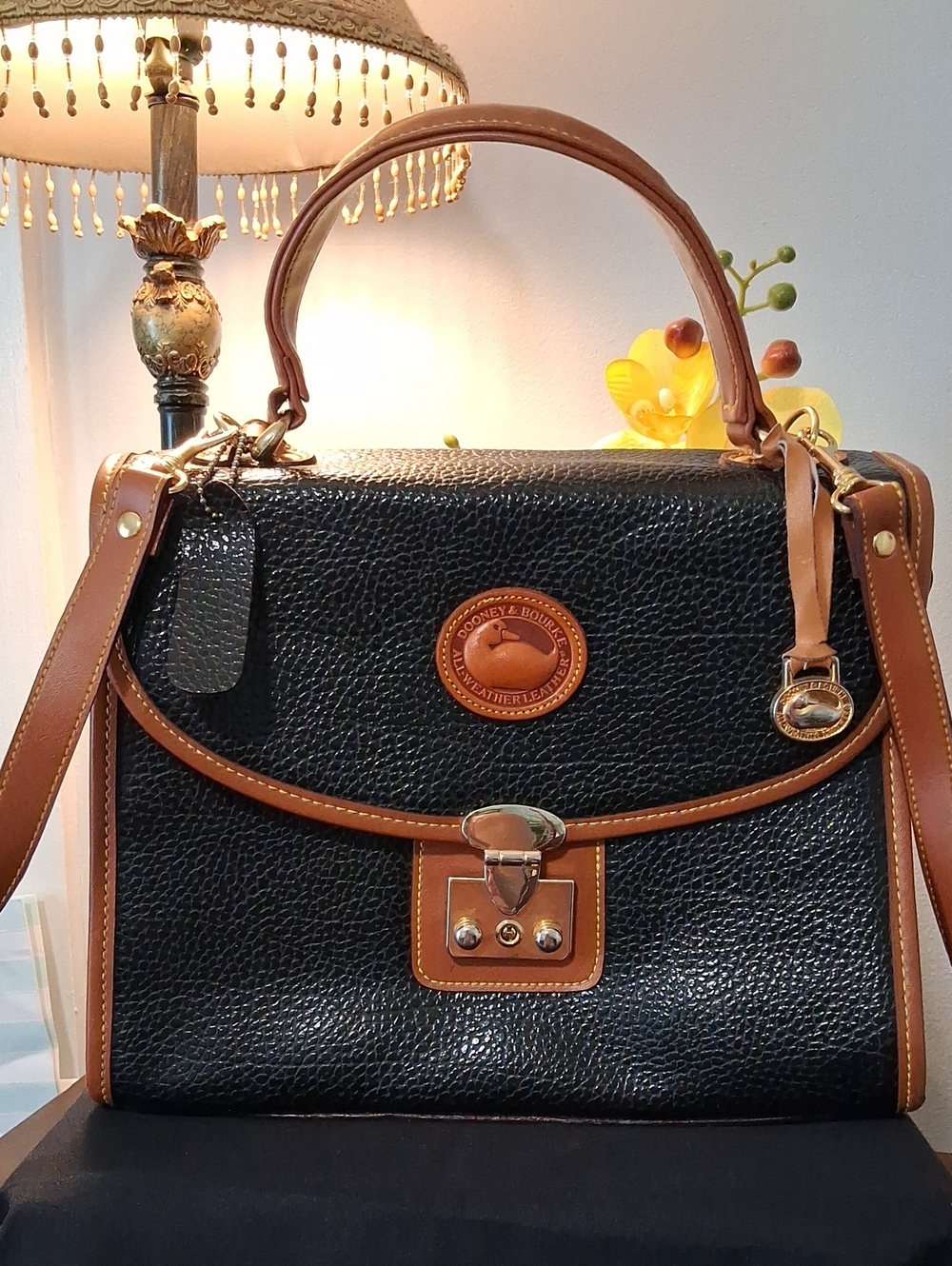 Dooney & Bourke Black Pebbled Leather Satchel with Brown Trim